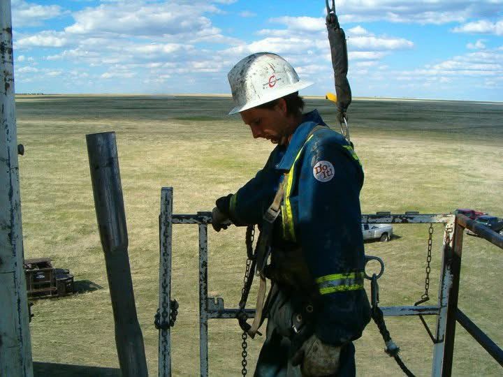 Ensign crew member working safely at height